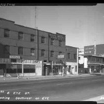 View shows a Liquor store, and Chinese American Chop Suey restaurant and a sign for the State Hotel entrance