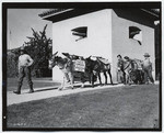[Burro packtrain leaving Sutter's Fort for Bay Bridge opening, 1936] (2 views)