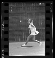 Mrs. James Mitchell of Hancock Park playing tennis, Calif., 1967