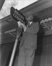 Bill Soberanes with a pipe and top hat in front of the Argus-Courier office, Petaluma, California, about 1950