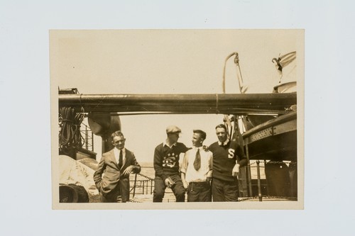 Four members of United States Olympic Rugby Team on deck of ship