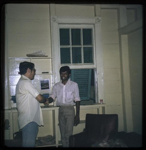 Jim Jones with Guyanese man