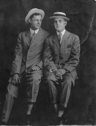 Two young men in straw hats and stiff collars, 1909