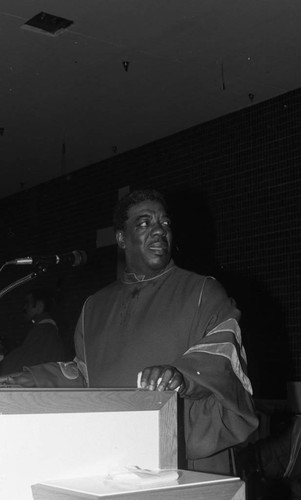 Rev. James Cleveland standing at the pulpit of the new Cornerstone Institutional Baptist Church, Los Angeles, 1984