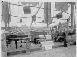 Gravenstein Apple Show, about 1930, showing a display of pianos and accordians with sign "Free Lessons, W. S. Borba"