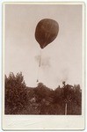 Acrobat and hot air balloon