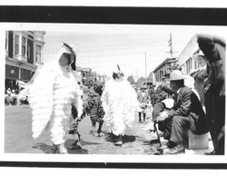 People dressed as chickens in Fourth of July parade, Petaluma, California, 1935
