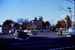 Parking lot of Safeway with the United Methodist Church in the background on Healdsburg Avenue in Sebastopol, California, 1970s