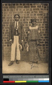 Husband and wife standing outdoors, Congo, ca.1920-1940