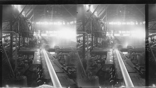 Interior of Steel Mill. Sawing a hot 20-inch beam. Rolling Mill. Rolling Mill. Homestead, Penna