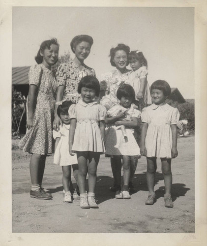 Three women and five little girls at Poston incarceration camp