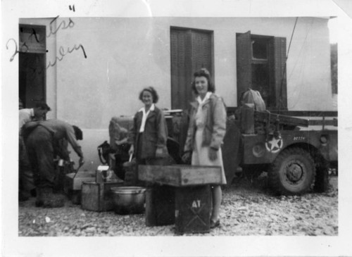 [Women from American Red Cross supplying food]