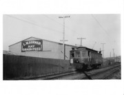 #40 Trolley passing L. W. Gorman Hay, Grain and Feed Suppliers, ca. 1930s-1940s