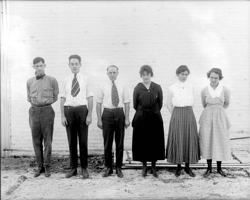 Group of six employees at the Mount Wilson Observatory optical shop, Pasadena