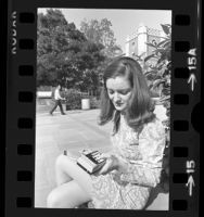 UCLA engineering student, Dianne Shows using a pocket calculator in Los Angeles, Calif., 1973