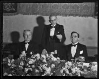 Robert Brennan, Milton H. Berry, and Rupert Hughes at luncheon, Los Angeles, 1935