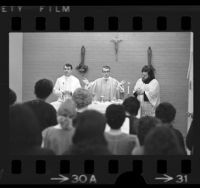 Cardinal Timothy Manning conducting Mass for inmates at Sybil Brand Institute for Women in Monterey Park, Calif., 1976