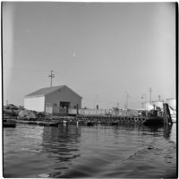 Departure pier for water taxis to Tony Cornero's newly refurbished gambling ship, the Bunker Hill or Lux, Los Angeles, 1946