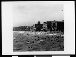 View of the Castle Del Mar, Edgewater and Breakers beach clubs in Santa Monica, looking north from the ocean, 1920