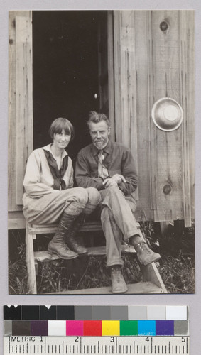 Alfred and Theodora Kroeber sitting on steps of cabin