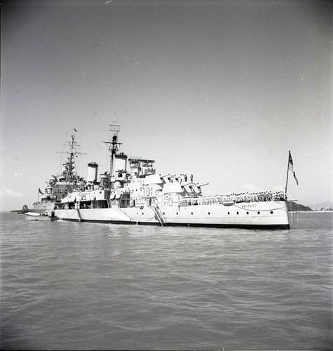 HMS Belfast light cruiser during military ceremony