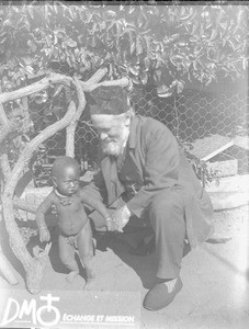 Missionary and little African boy, Pretoria, South Africa, ca. 1896-1911