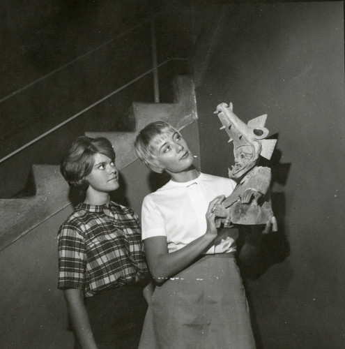 Two women with a sculpture, Scripps College