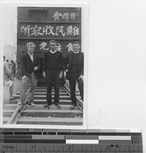 Maryknoll Fathers on train tracks at Hong Kong, China, 1939