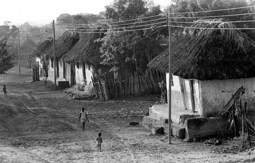 Children walking in the street, San Basilio de Palenque, 1976