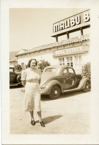 Woman in front of the Malibu Beach Cafe, 1940