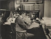 Frederick M. Sammis at his desk