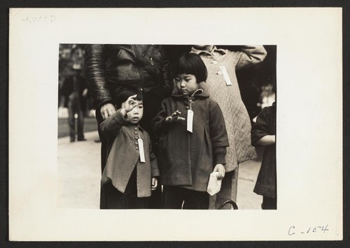 Hayward, Calif.--Two children of the Mochida family who, with their parents, are awaiting evacuation bus. The youngster on the right