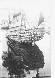 1912 Gravenstein Apple Show display of the sinking Titanic made of whole and dried sliced apples in a square pool of water