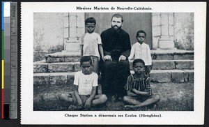 Missionary father poses with four children, Hienghène, New Caledonia, ca.1900-1930