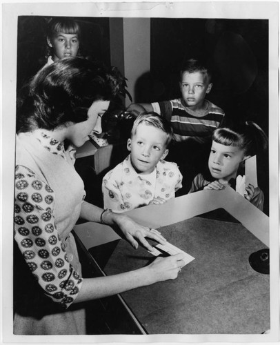 Librarian and Children at Mabel Gillis