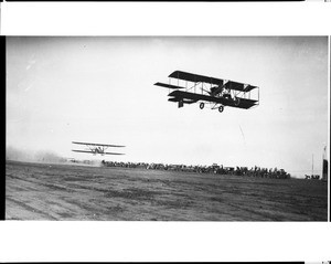Aviators Elmer Cook and Philip Parmelee in the air at the Dominguez Hills Air Meet, 1912