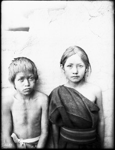 Two Hopi Indian children standing outside, 1903