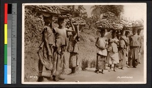 Women carrying large trays of plantains on their heads, Ghana, ca.1920-1940