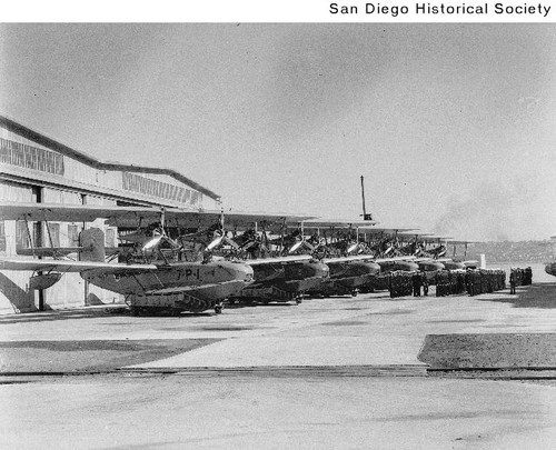 Row of seaplanes in front of a hangar at the North Island Naval Air Station