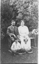 John & Nellie Hansen seated with Carl and Theodore