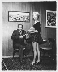 Selling raffle tickets at the Flamingo Hotel, Santa Rosa, California, 1960