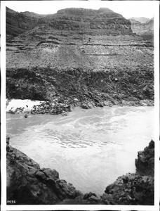 Distant view of the Bass Ferry crossing the Colorado River, Grand Canyon, ca.1900-1930