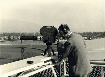 Eric Berndt filming at a race track
