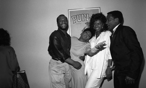 George Howard, Anita Baker, Natalie Cole, and Donnie Simpson posing together at the 11th Annual BRE Conference, Los Angeles, 1987