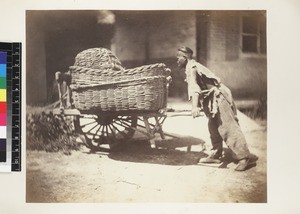 Man pushing cart of manure, Beijing, China, ca. 1861-1864