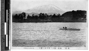 Two people in a row boat, Japan, ca. 1920-1940