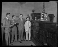 Leo P. Kelley, charged with murder, before a judge with attorney S. S. Hahn, Los Angeles, 1928