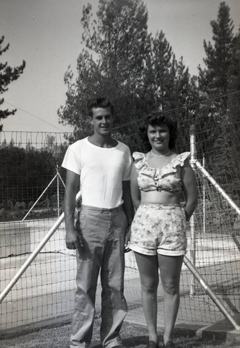 Man and woman at Malibu Lakeside clubhouse swimming pool