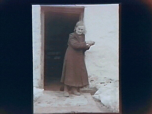 Old Woman in Cottage Doorway