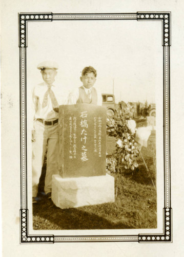 Two Boys at a Gravesite